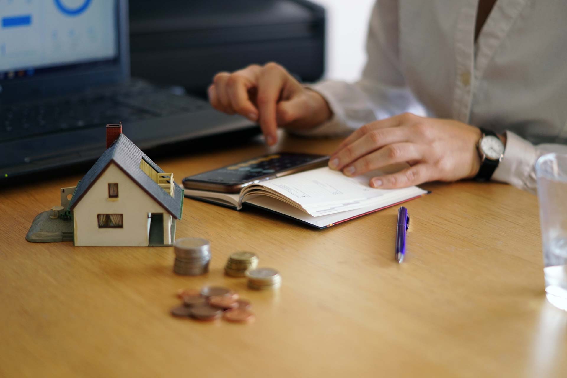 closeup shot person thinking buying selling house